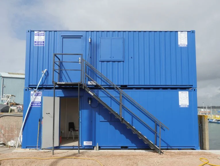 Philspace shipping containers stacked in a building site