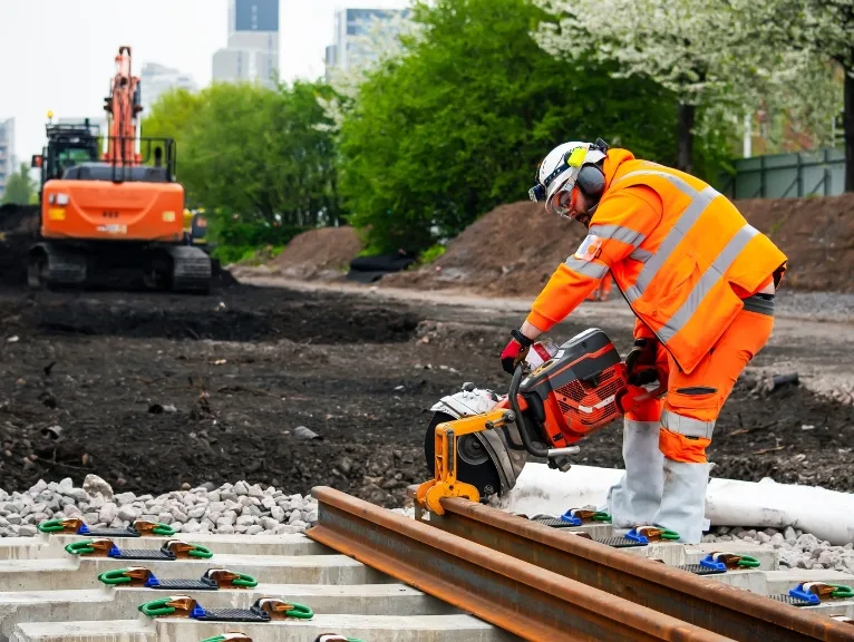 Construction workers on a railroad