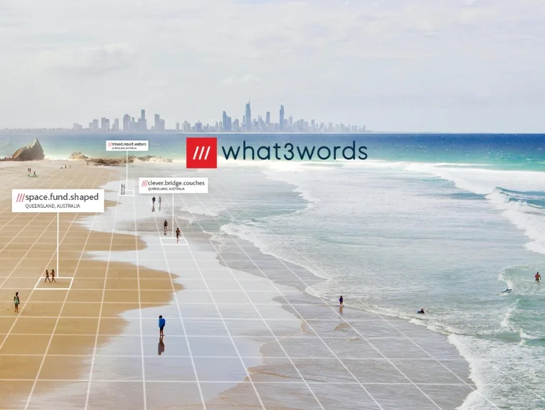 the What3Words logo and display, stylised, of how the app works